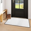 Area Rug with Black Binding 31"x20"